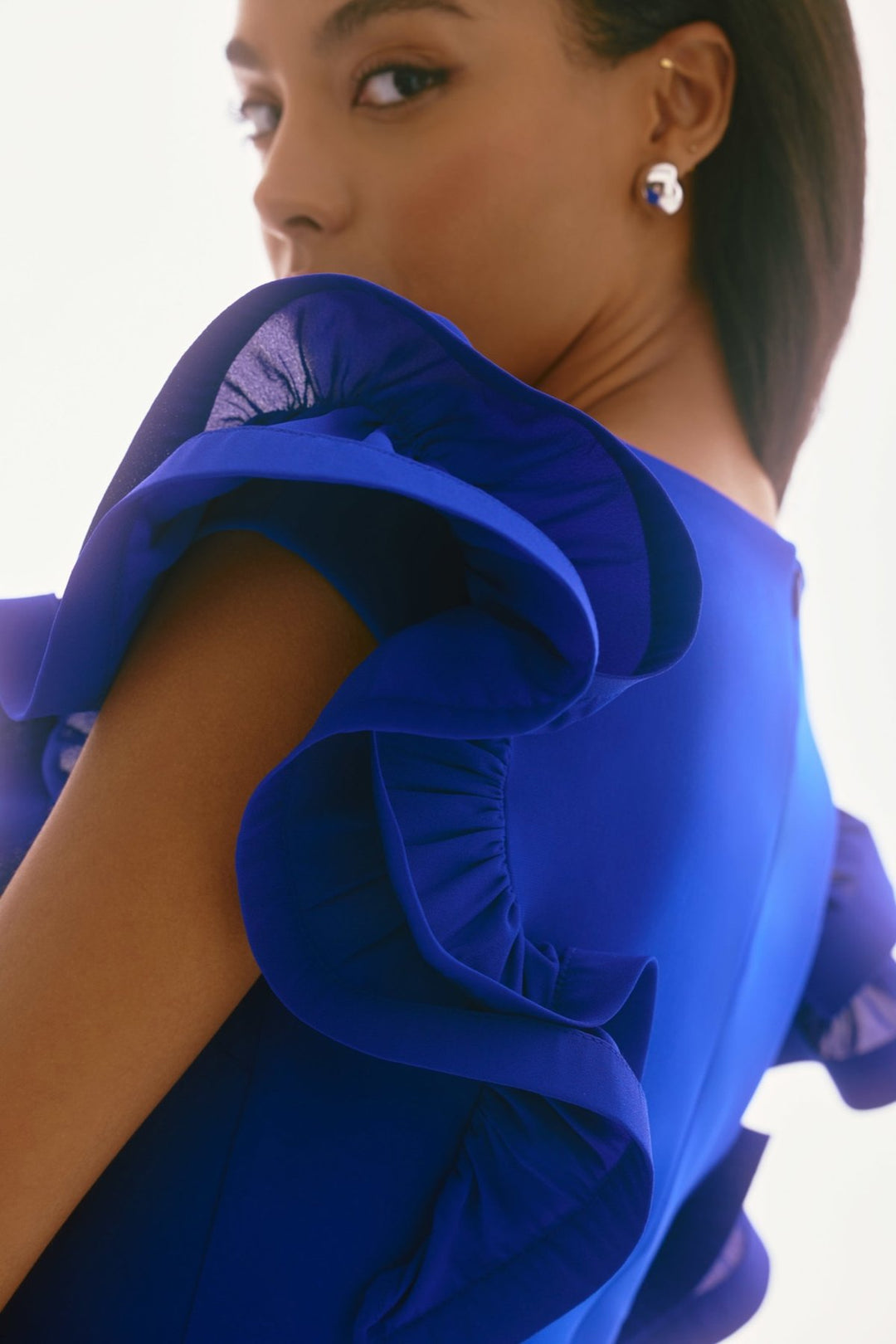 Elegant and stately occasion dress highlighting Boutique Eclettica’s formal collection.